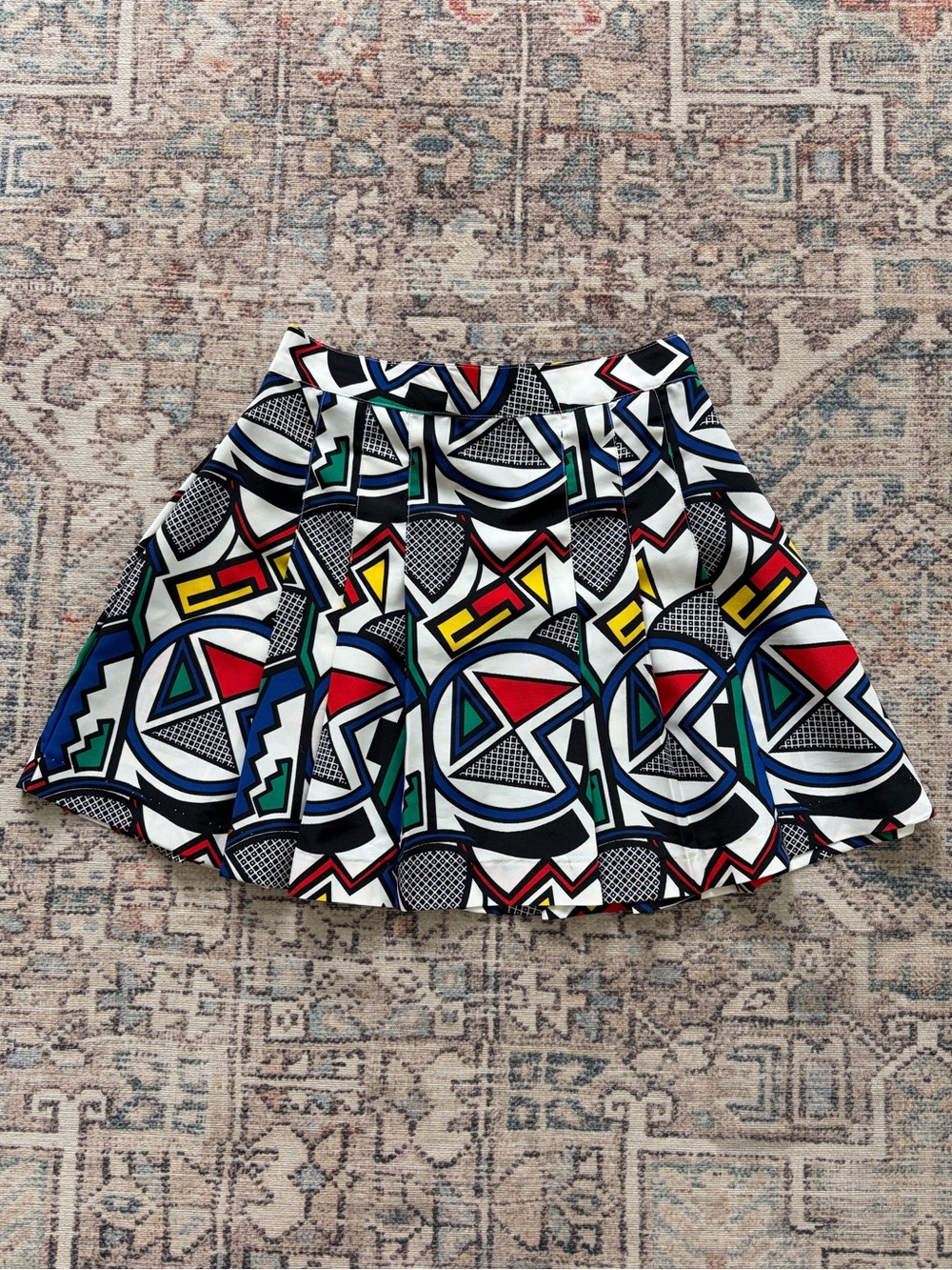 Westbound Pleated Skirt with Red, Blue, Green & Yellow Geometric Print